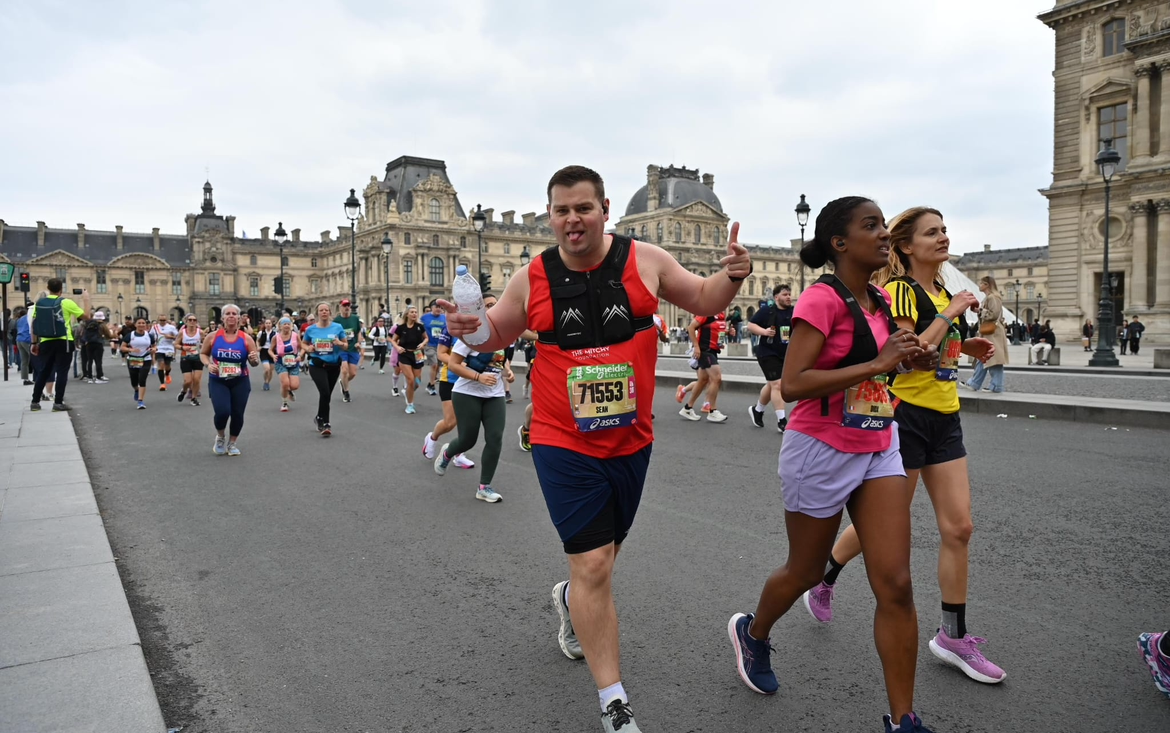 Runner past the Louvre, Paris Marathon